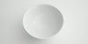 View of the inside of a white stoneware bowl crafted by Xu De Jia.