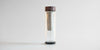 The fully assembled large thermos, without the cozy. The strainer is locked onto a lip inside the glass thermos, and has space for tea leaves either inside the strainer or underneath it.