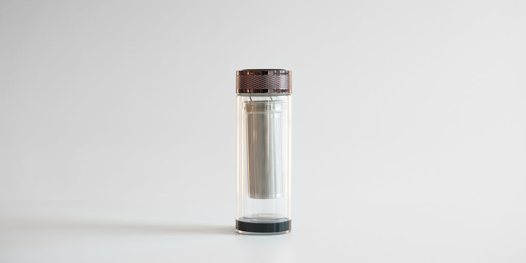 The fully assembled small thermos, without the cozy. The strainer is locked onto a lip inside the glass thermos, and has space for tea leaves either inside the strainer or underneath it.