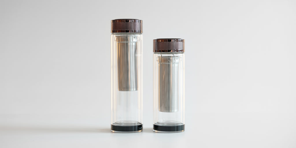 Two fully assembled thermoses side by side. The one on the left is larger, the one on the right is slightly shorter.