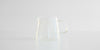 Side view of a small glass server.