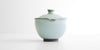Front view of the shiboridashi showing the hand-shaped spout.