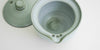 Close up of the shiboridashi's built-in strainer, made up of three holes punched into the clay near the spout.