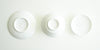 The bottoms of all the pieces for the gaiwan. From left to right, the plate, the bowl, and the lid